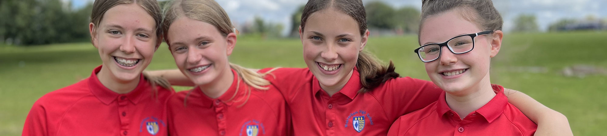 School girls on field in Tarporley